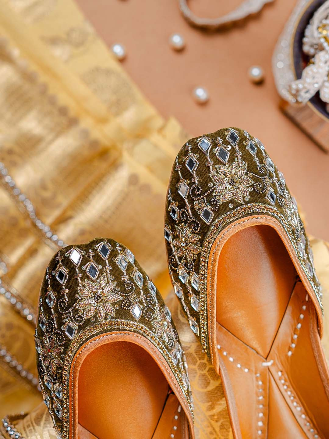 NR By Nidhi Rathi Women Olive Green Handcrafted Mirror & Golden Work Ethnic Juttis