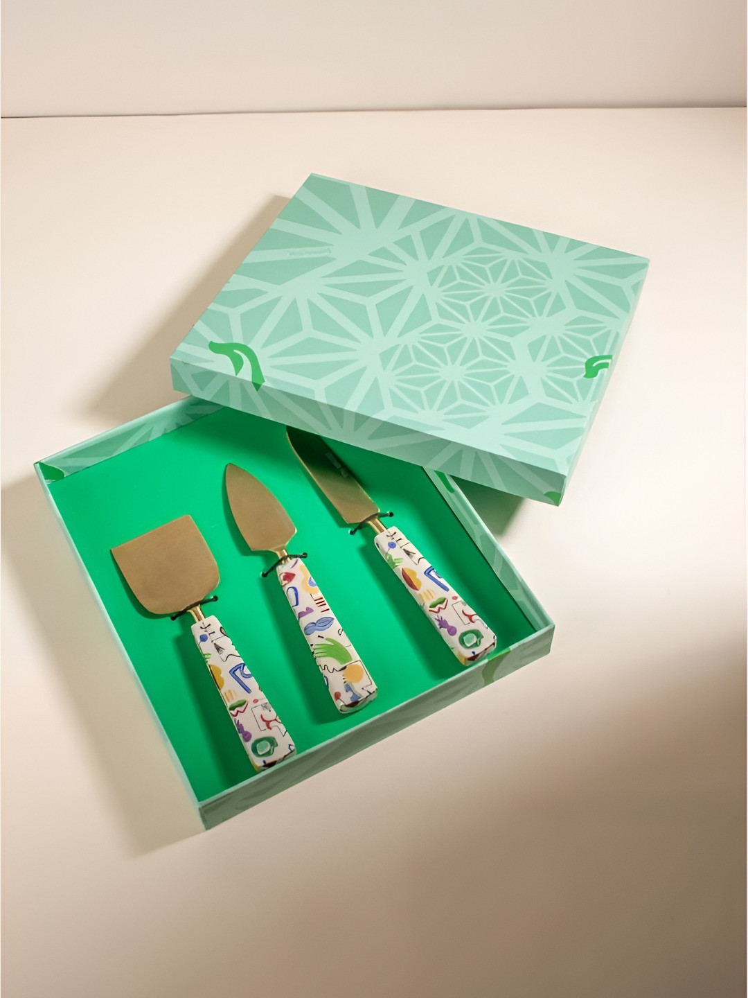 FREEDOM TREE Face To Face Cream-Coloured & Gold Toned 3Pieces Printed Steel Cheese Servers