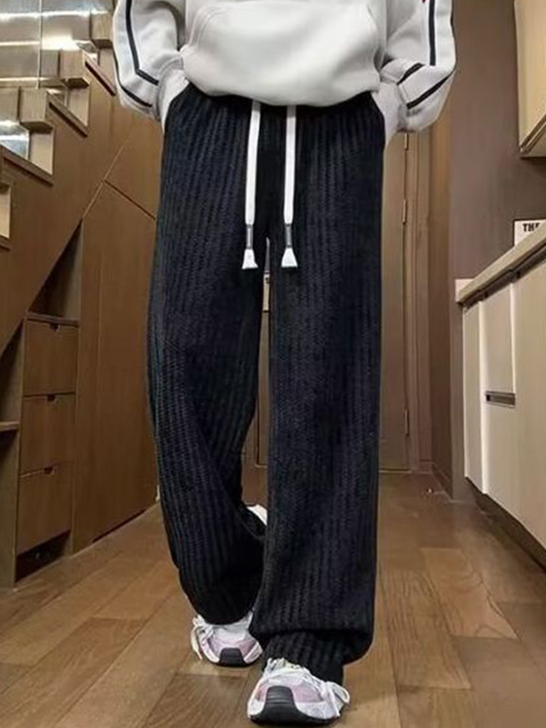 StyleCast x Revolte Men Self Design Loose Fit Mid-Rise Flat-Front Regular Trousers