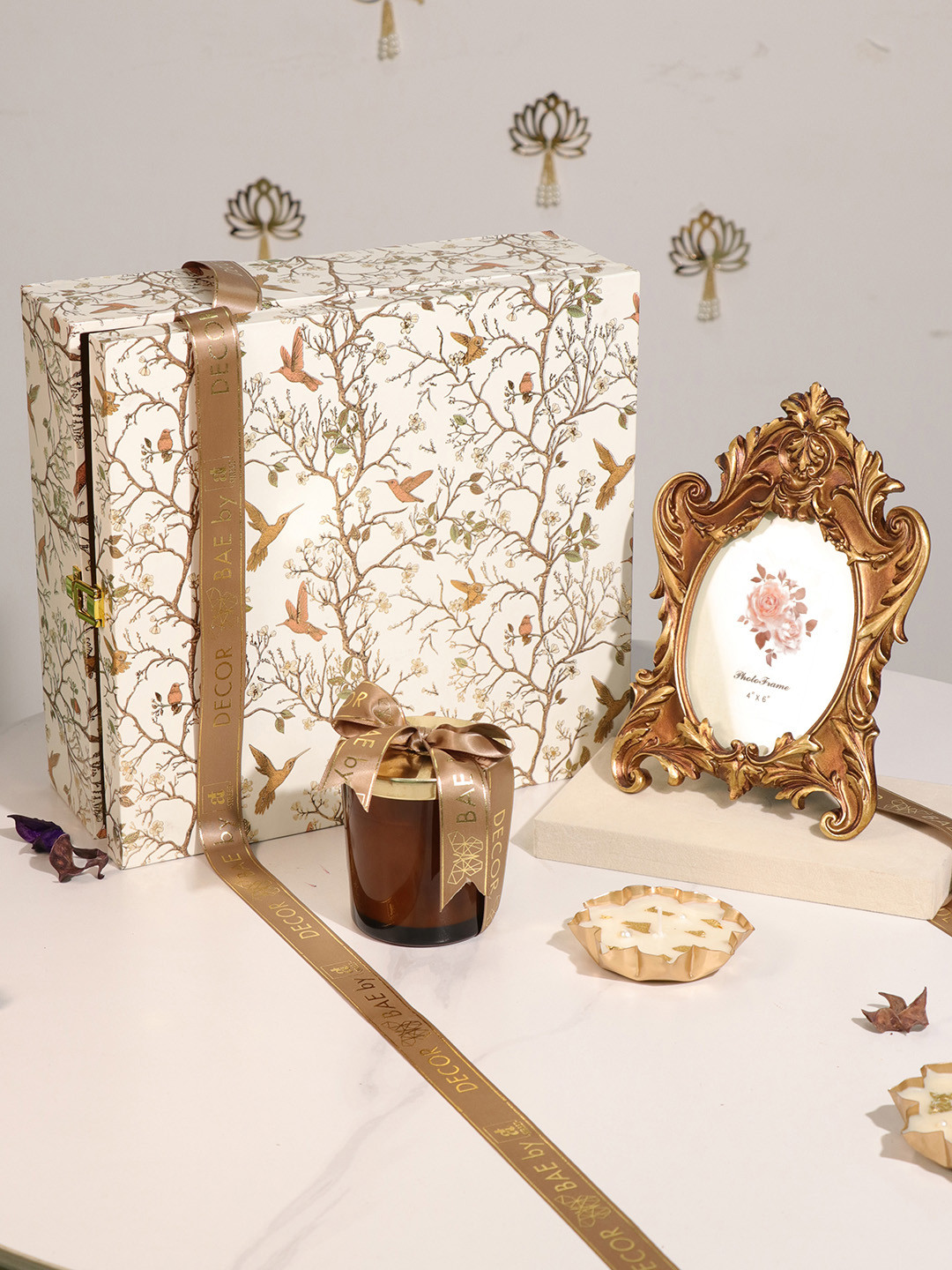 Art Street Silver Toned 4 Pieces Ganesh & Laxmi Idol With Mogra Scent Candle