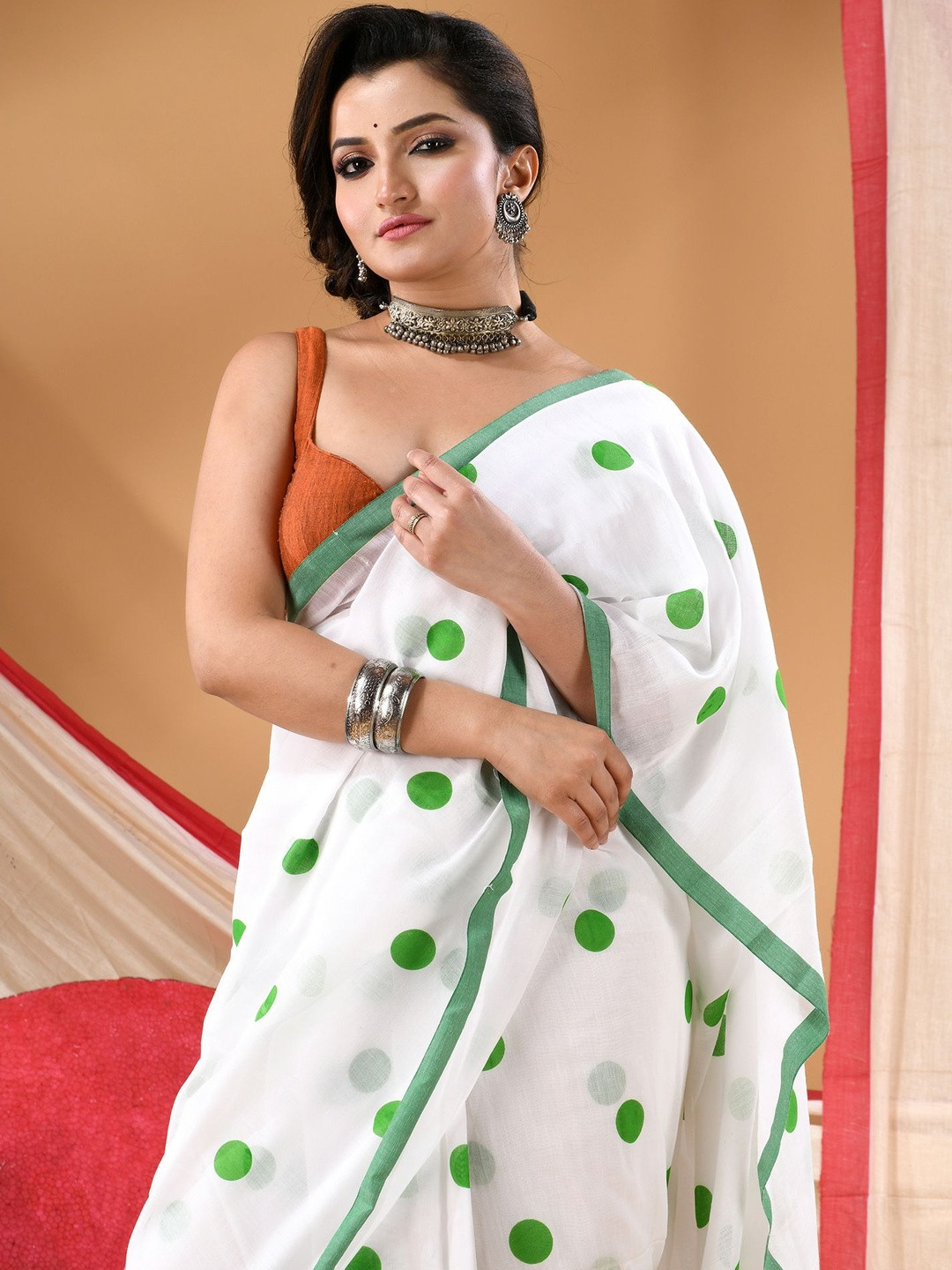 DESH BIDESH Polka Dot Printed Saree With Tessals