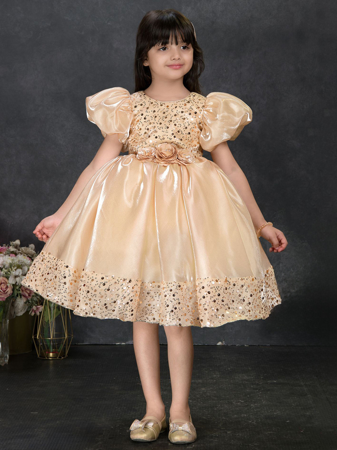 Lagorii Girls Sequin Party Wear Frock with Puffy Sleeves and Floral Waist Detail Gold