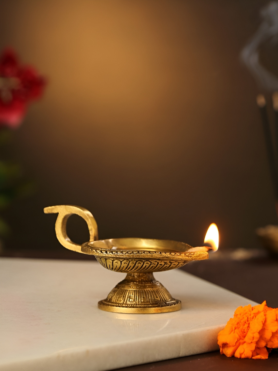 Revive Home Gold-Toned Textured Paan Leaf Shape Diya
