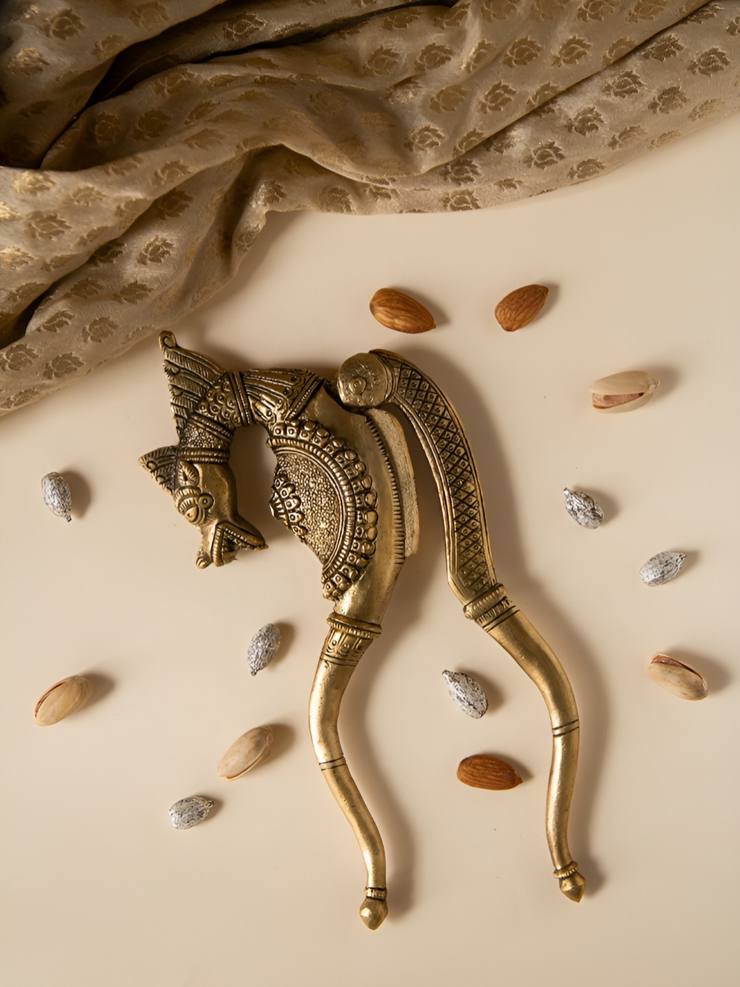 Imli Street Gold-Toned And Black Yali Brass Nut Cutter Sarota