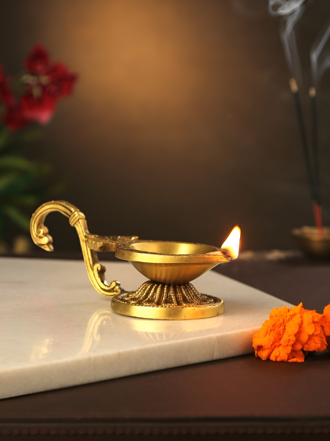Revive Home Gold-Toned Textured Diya With Swan Handle