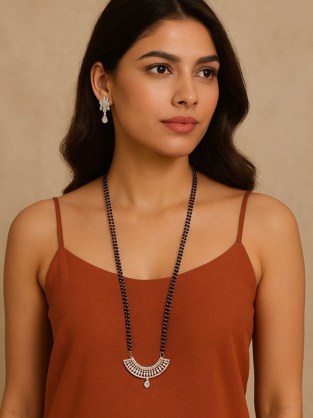 Digital Dress Room Gold-Plated AD Studded Curved Shaped Mangalsutra With Earrings