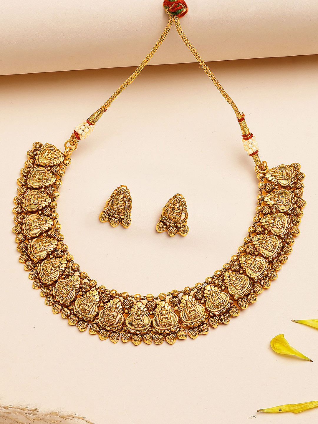 KARATCART Gold-Plated Laxmi Mata Engraved Kalash Design Necklace and Earrings