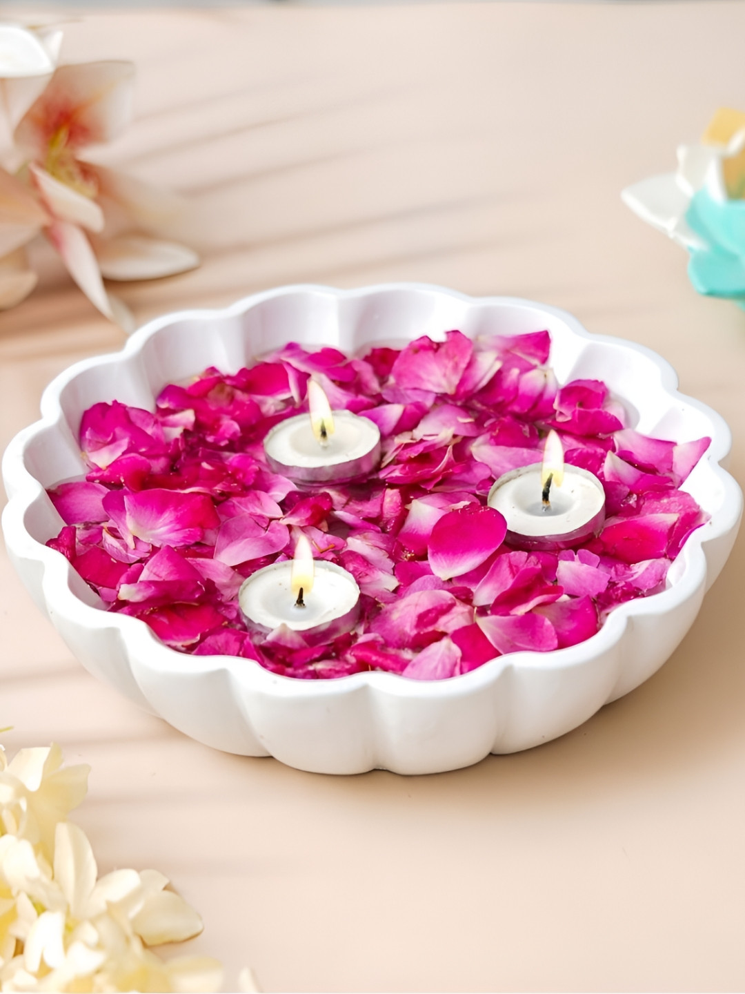 eCraftIndia White Flower Urli Decorative Bowl With Candle Holder