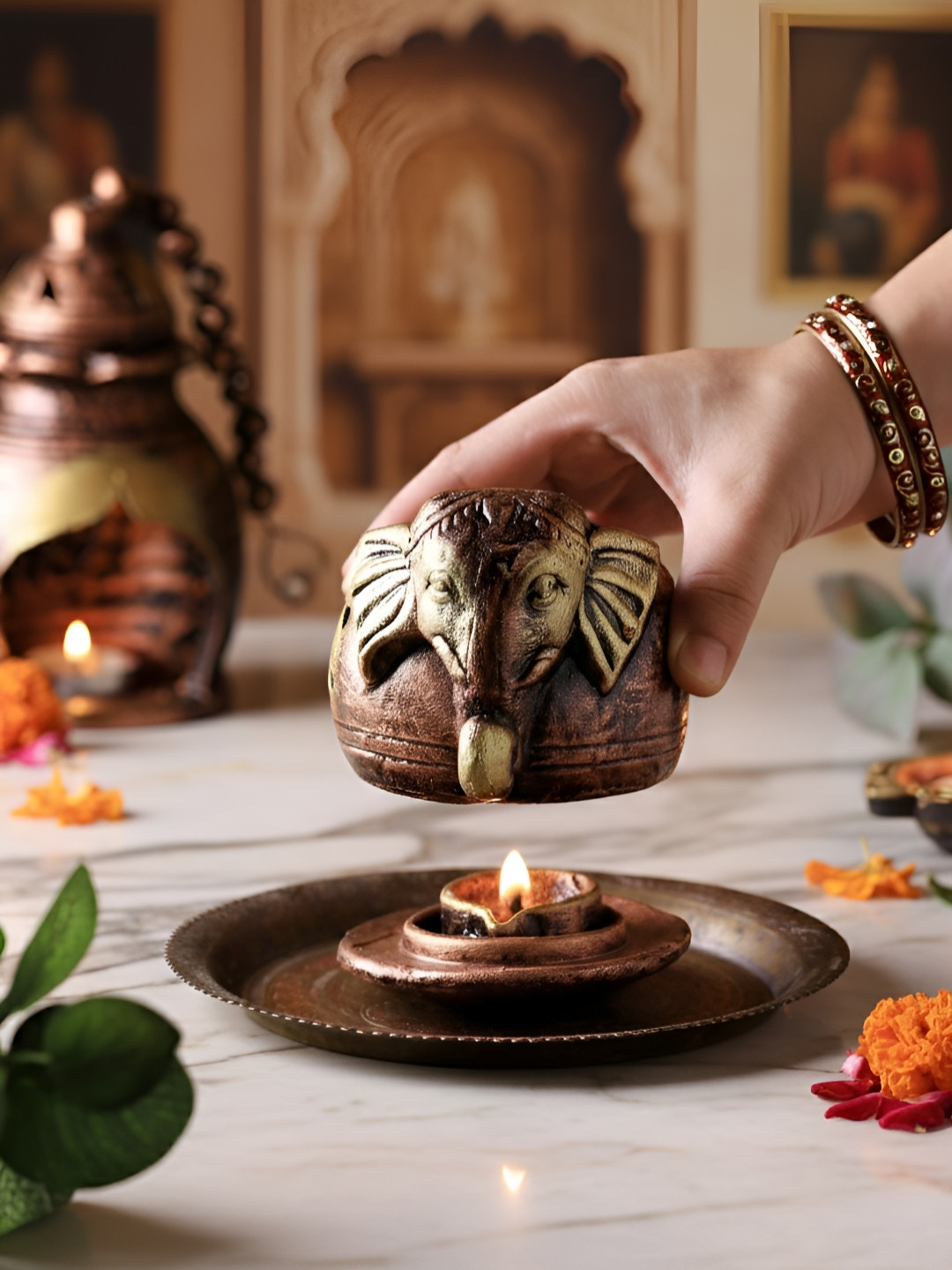 The handicraftian Bronze Toned & Gold Toned Textured Elephant Designed Table Diyas