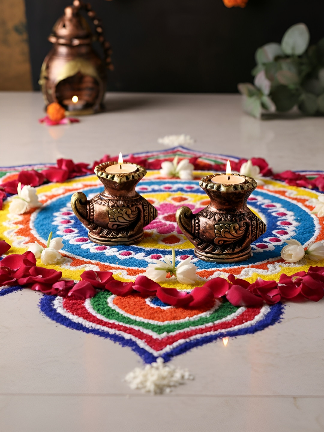 The handicraftian Bronze Toned & Gold Toned 2 Pieces Textured Sankh Designed Diyas