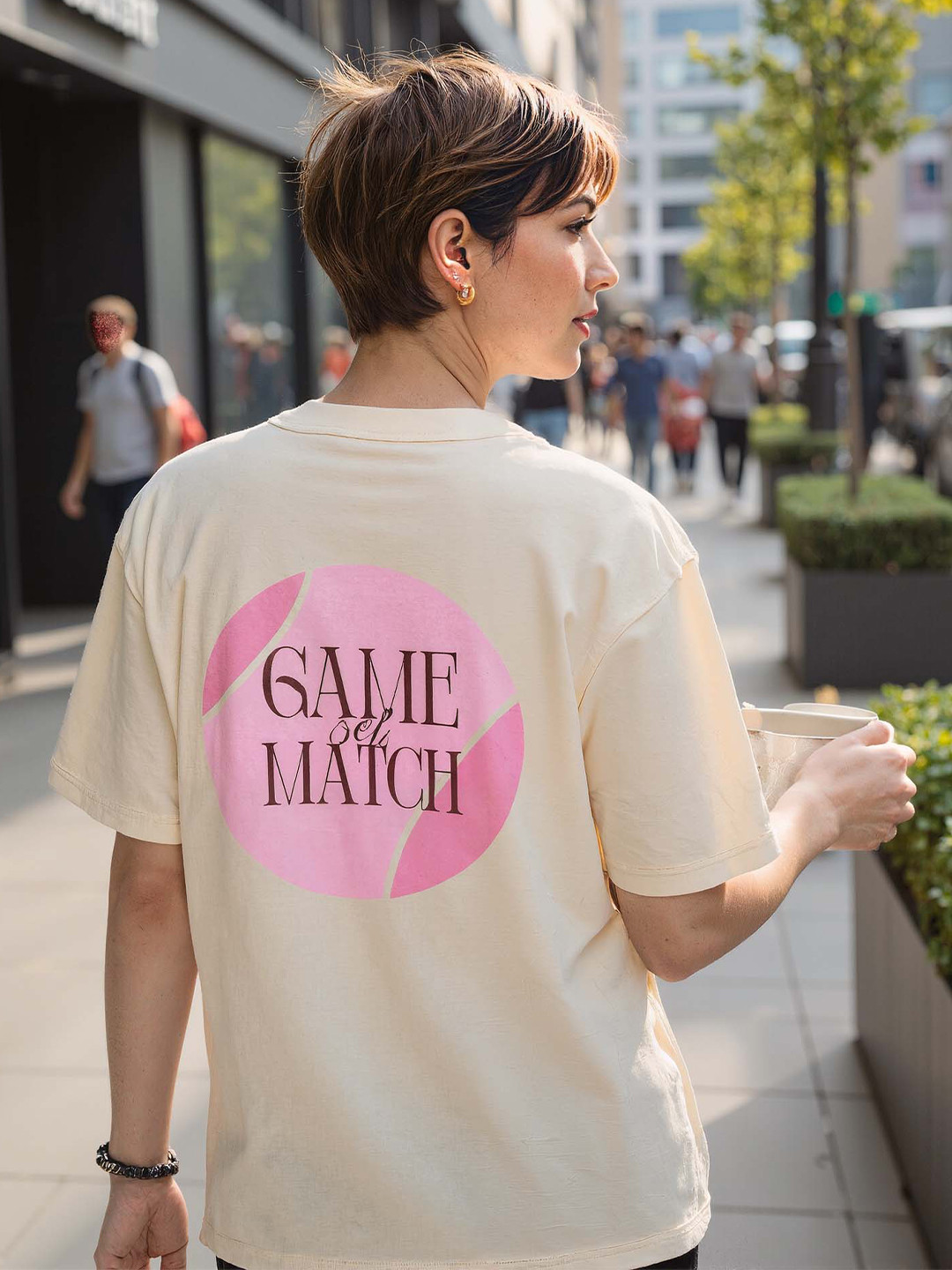 CAVA Women Cream Serve Side Oversized Printed Cotton-Spandex Tee