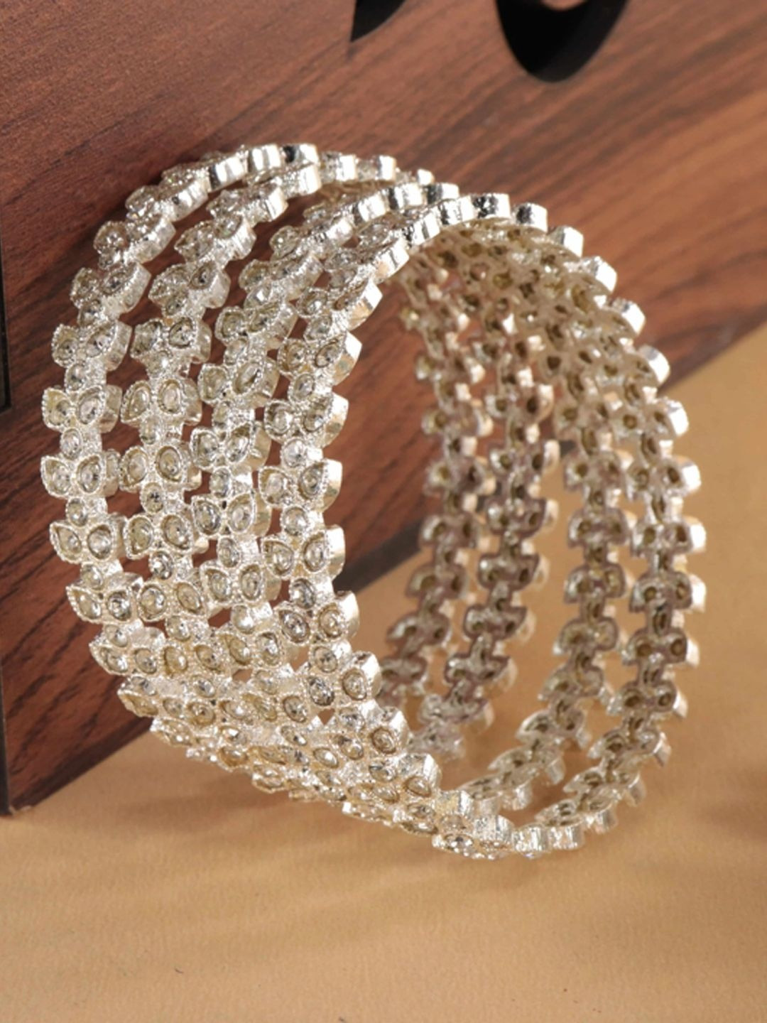 ZULKA Women Pack of 4 Zircon Stones Studded Bangles Set