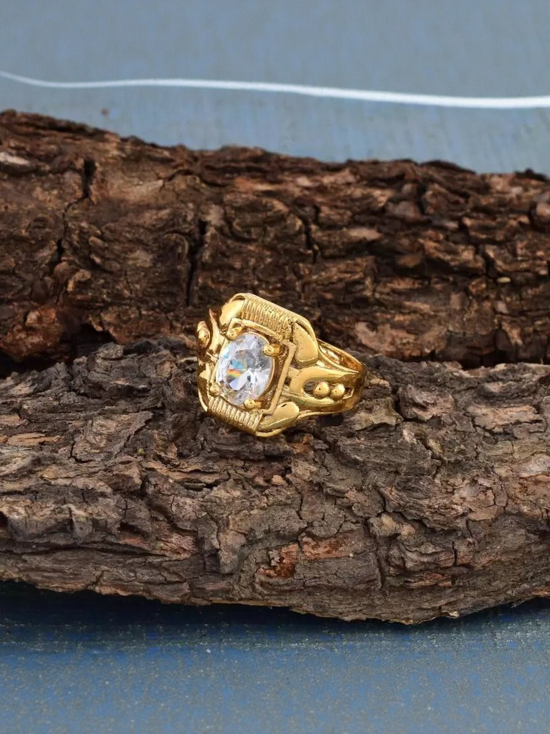 DZINETRENDZ Brass Goldplated Imitation Diamond CZ Fingerring