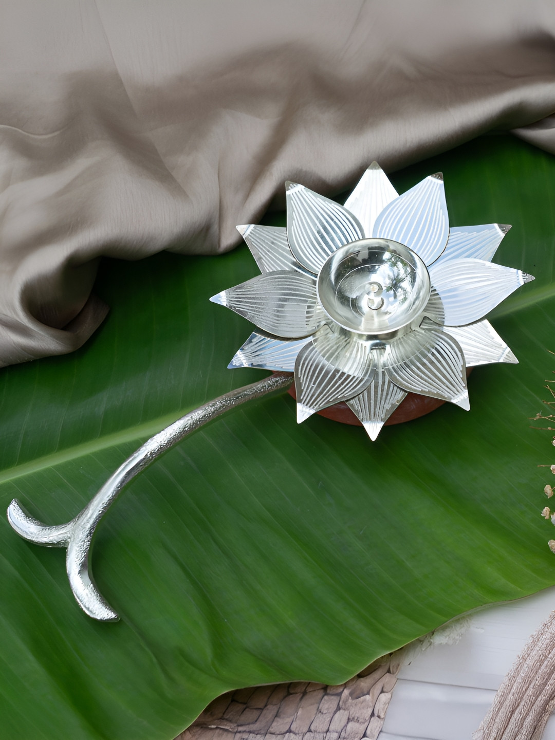 The Zappy Box Silver-Toned Textured German Silver Lotus Diya With Stand