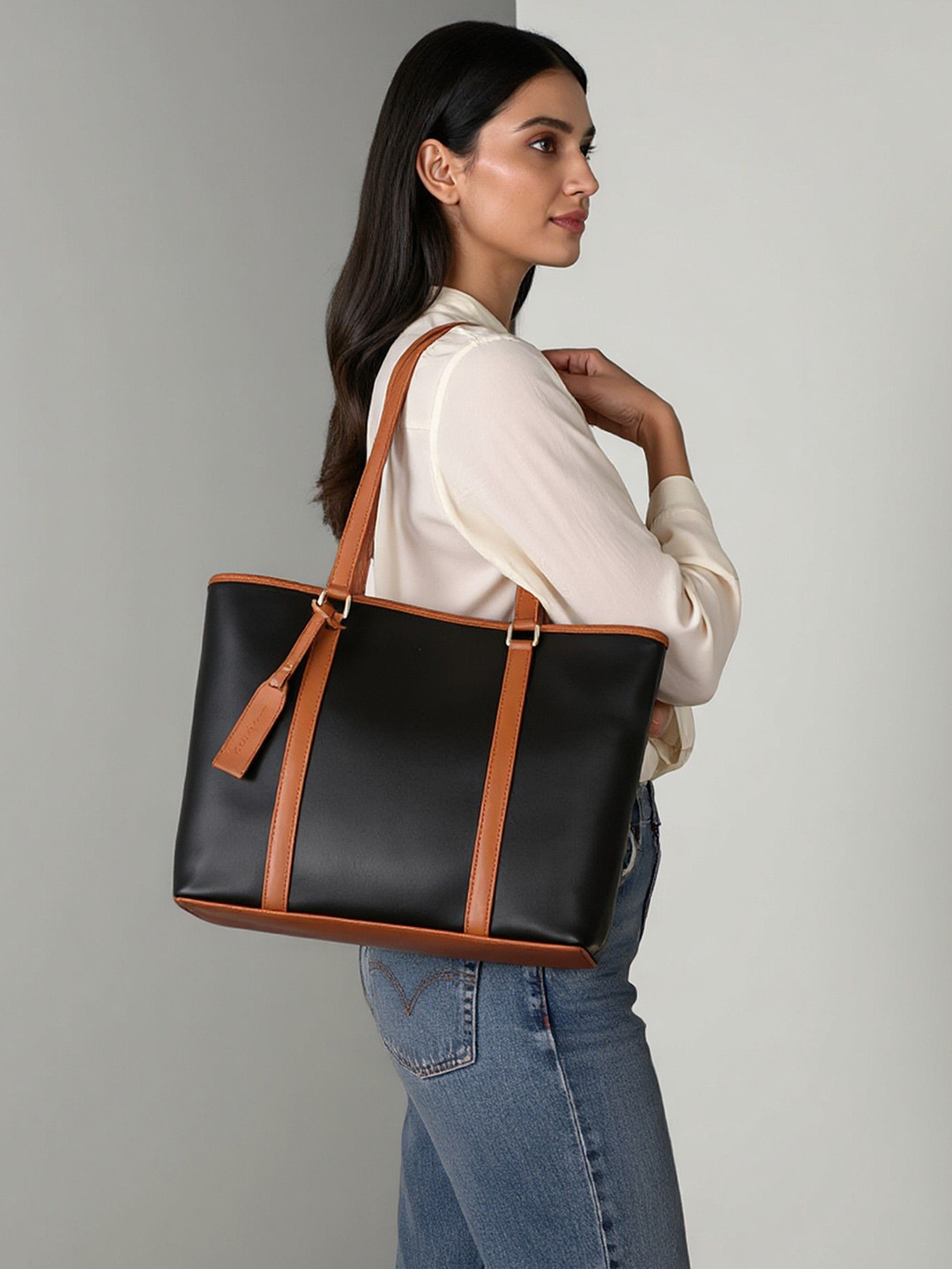 Mast & Harbour Women Solid Structured Tasselled Luxe Shoulder Bag
