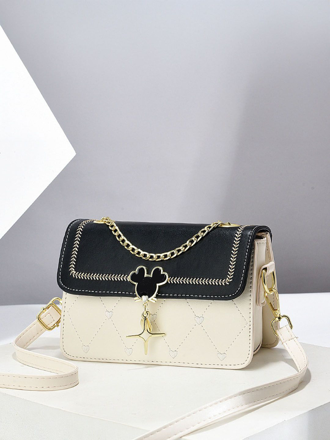 StyleCast Mouse Buckle Embellished Crossbody Sling Bag