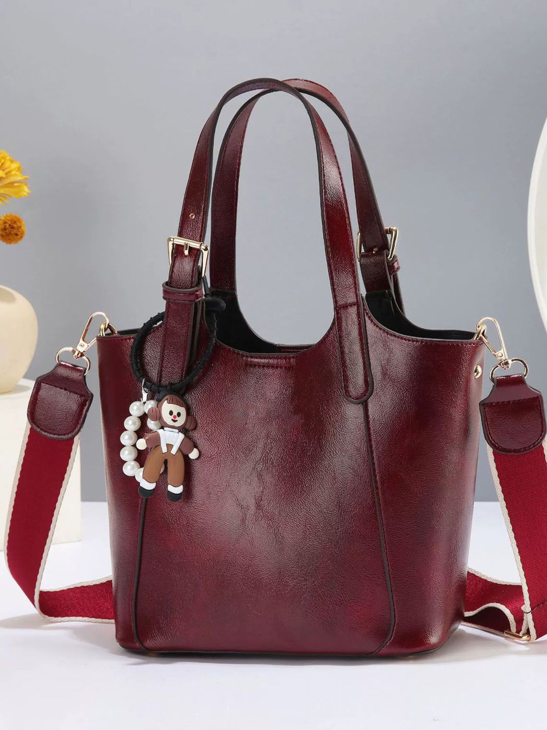 StyleCast Textured Structured Handheld Bag With Charm Detail