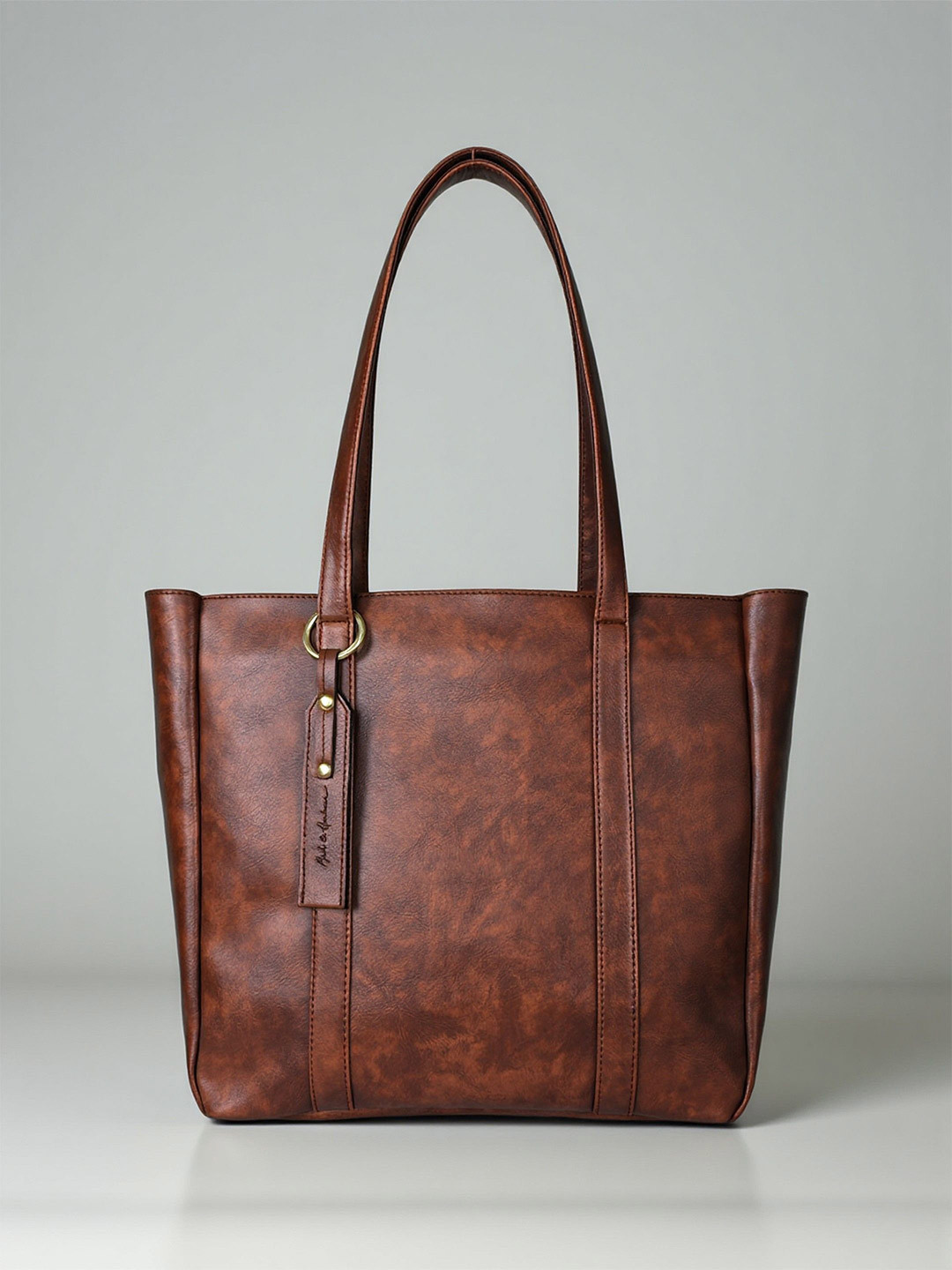Mast & Harbour Women Solid Structured Tasselled Urban Shoulder Bag