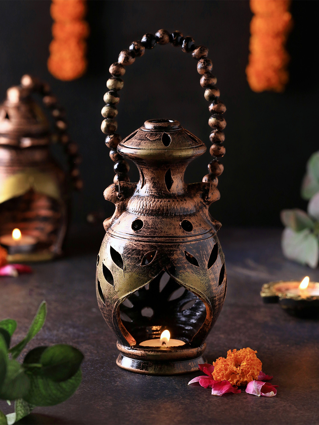 The handicraftian Bronze-Coloured & Gold-Toned Textured Terracotta Candle Holder