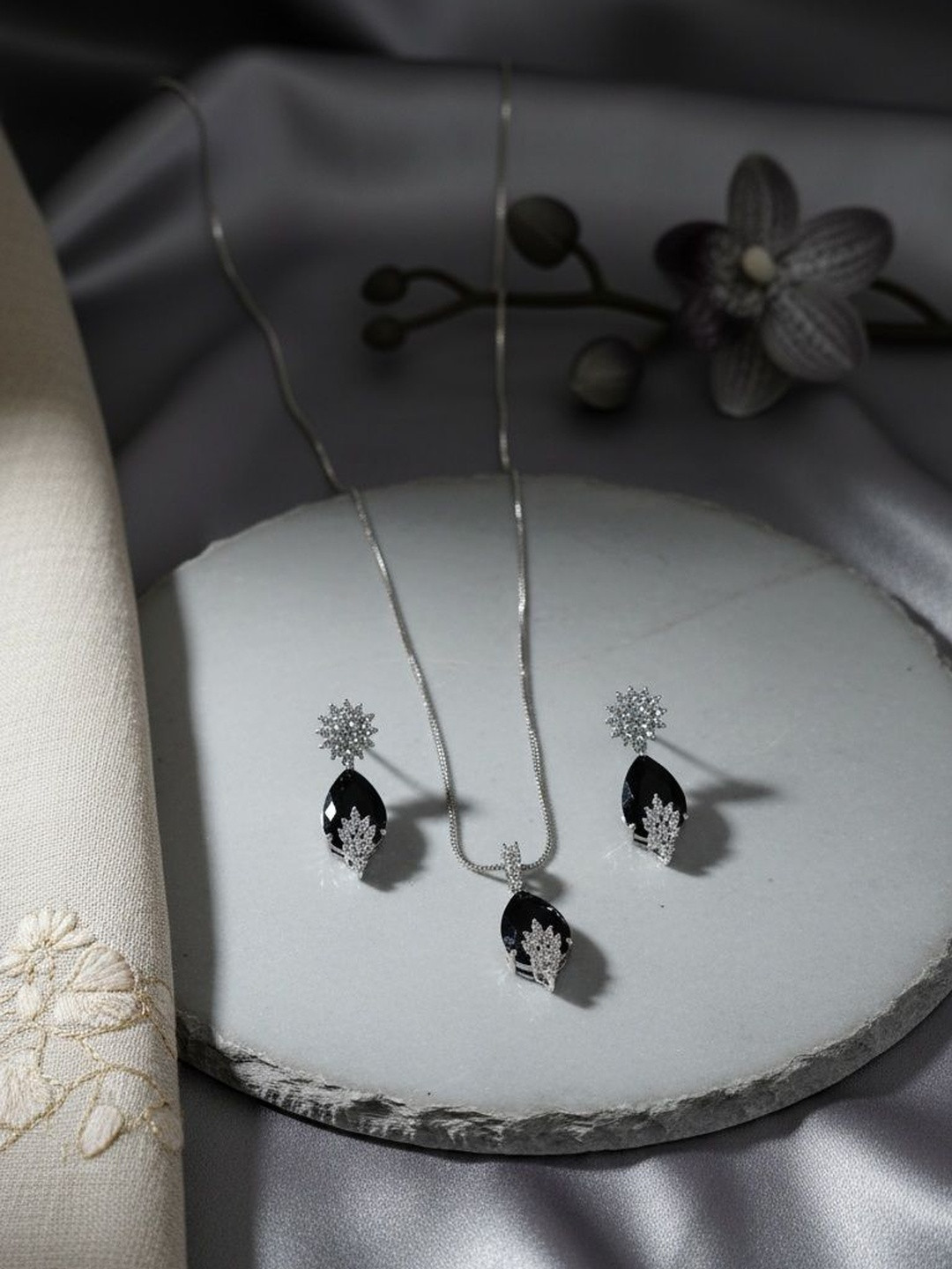 Arjun Traders Silver-Plated Artificial Stone Studded Pendant With Chain And Earrings