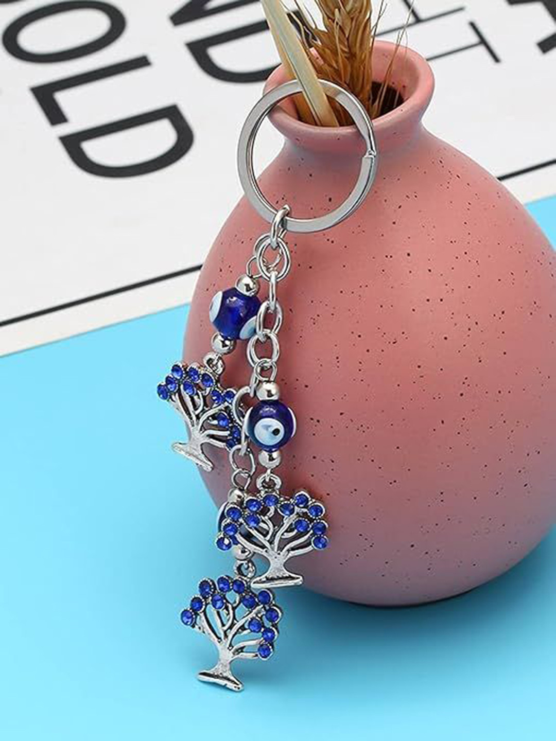 AUGEN Evil Eye Trees Design Textured Metal Key Chain