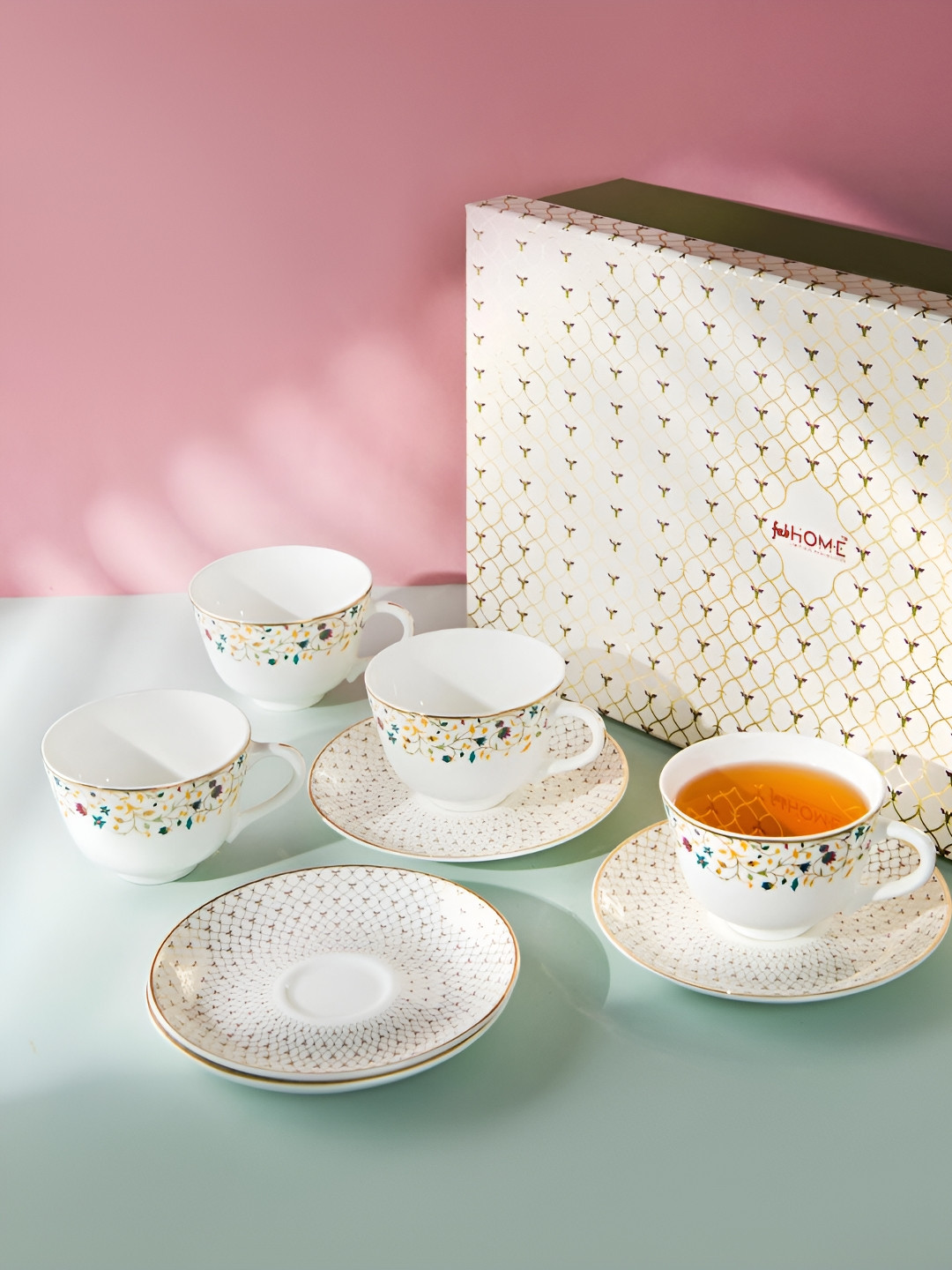 Fabindia Suvarn White & Orange-Coloured 8 Pieces Floral Printed Ceramic Tea Set