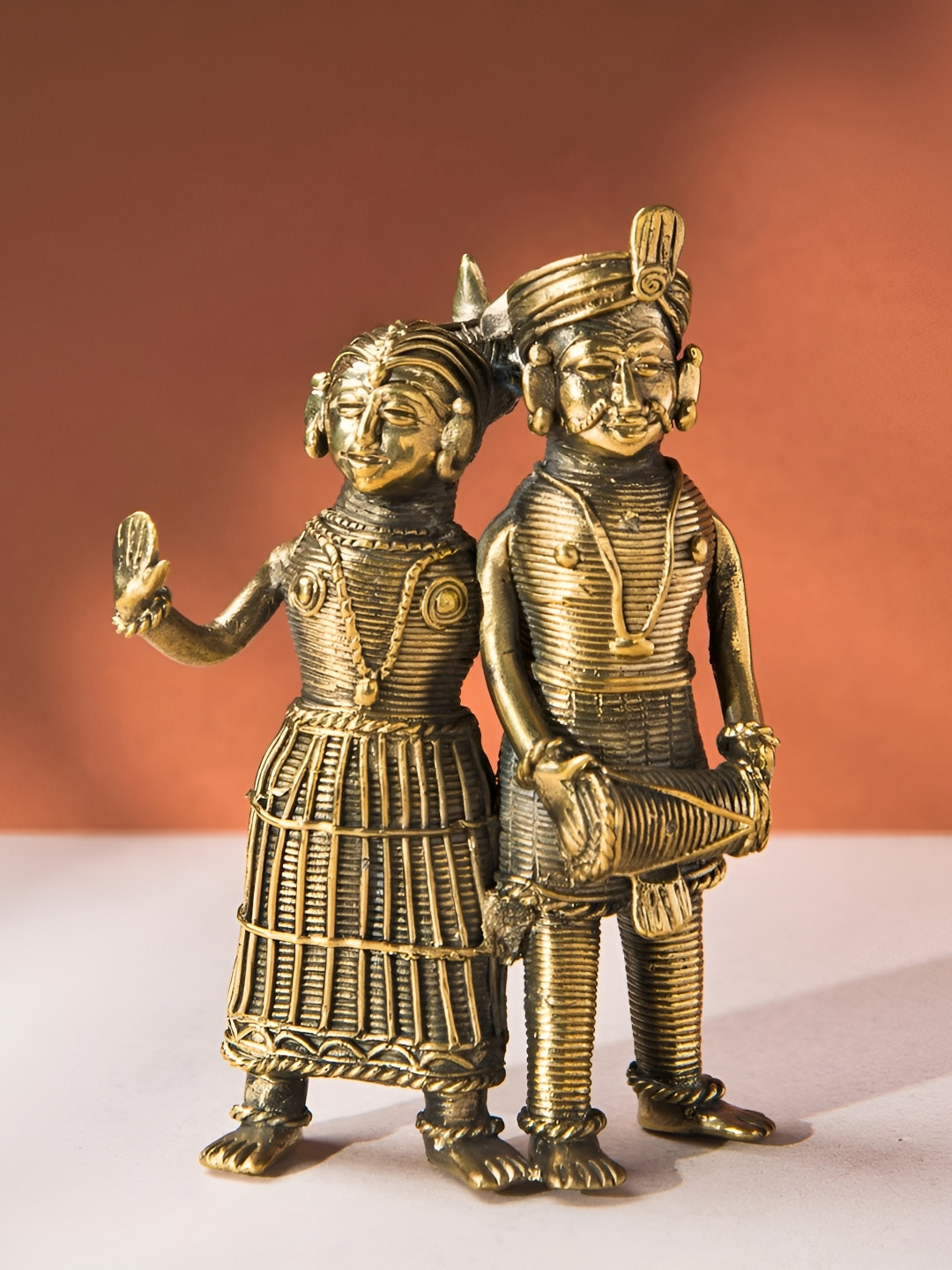 Fabindia Yatan Gold-Toned & Black Couple Brass Figurine Showpiece