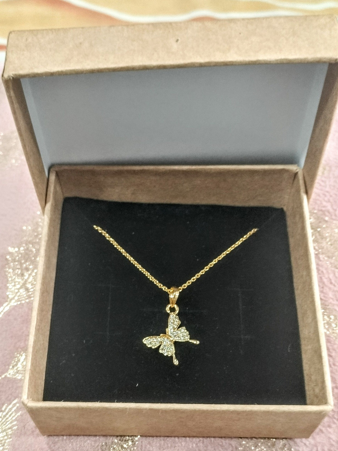 ECOMKNP Gold-Plated Artificial Stones Butterfly Shaped Pendant With Chain