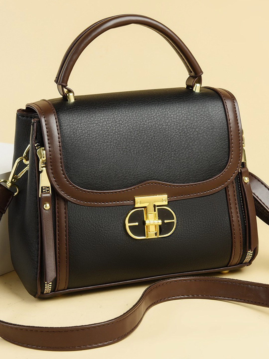 Diva Dale Solid Tasselled Small Structured Handheld Bag