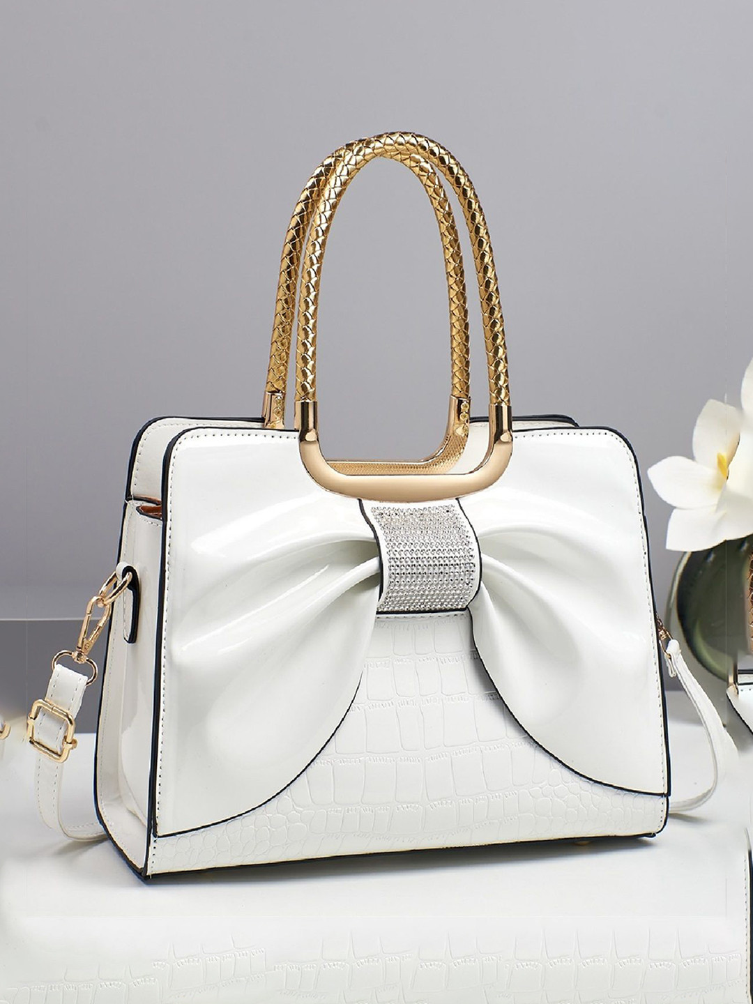 StyleCast Textured Structured Bow Detail Handheld Bag With Detachable Sling Strap