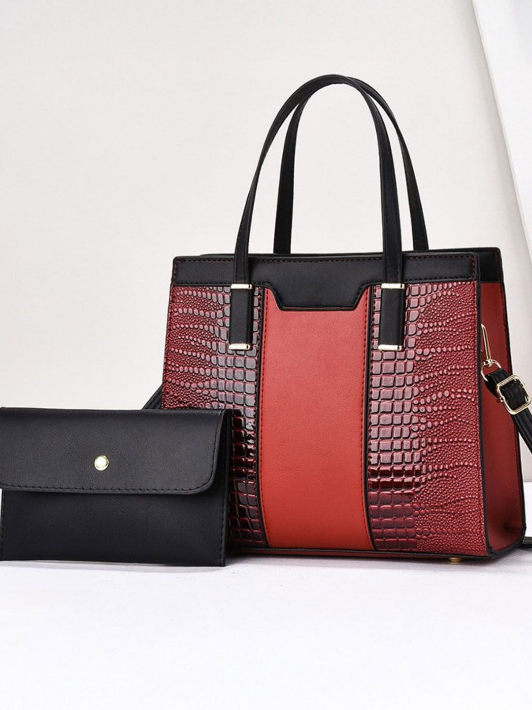 StyleCast Black & Burgandy Textured Swagger Handheld Bag