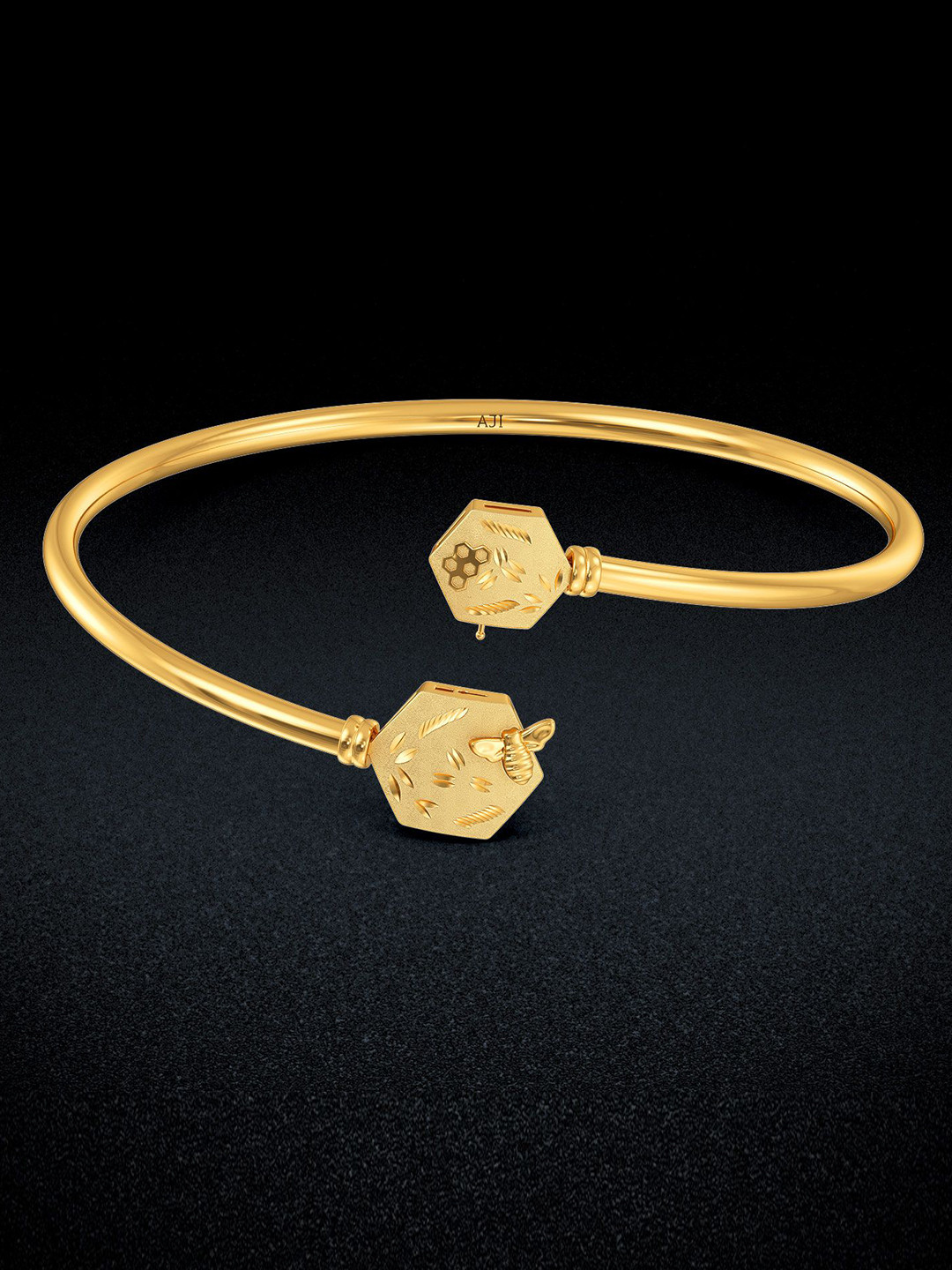 Joyalukkas 22KT Beehive Elegance Gold Bangle- 9.01 gms