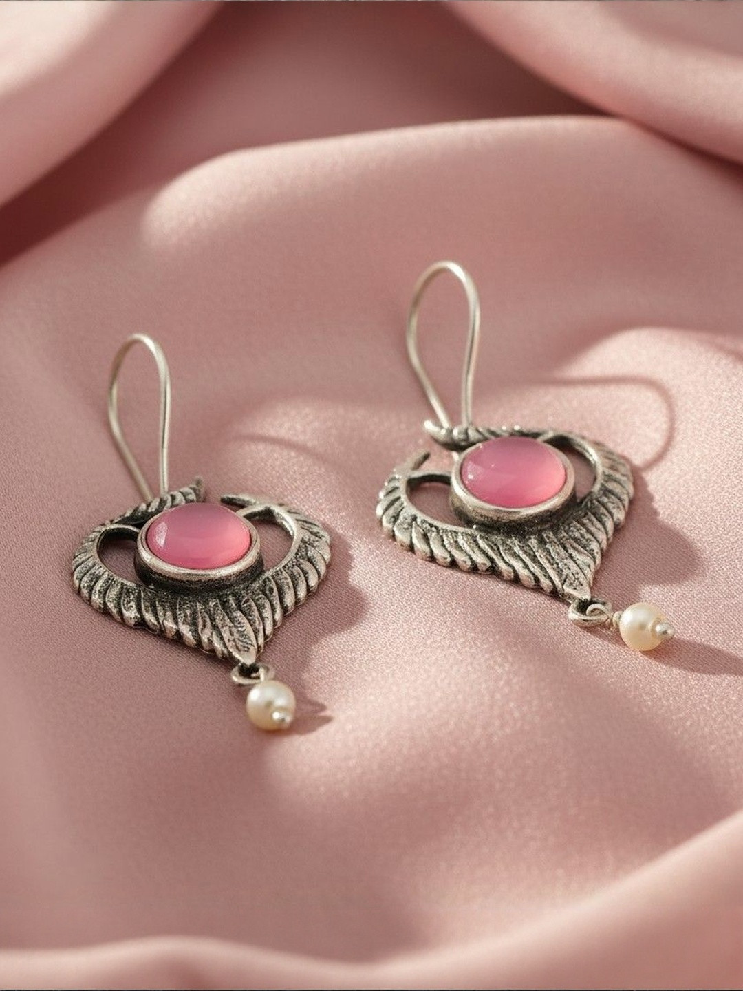 The Pari Sliver Plated Artificial Stones Studded Contemporary Drop Earrings