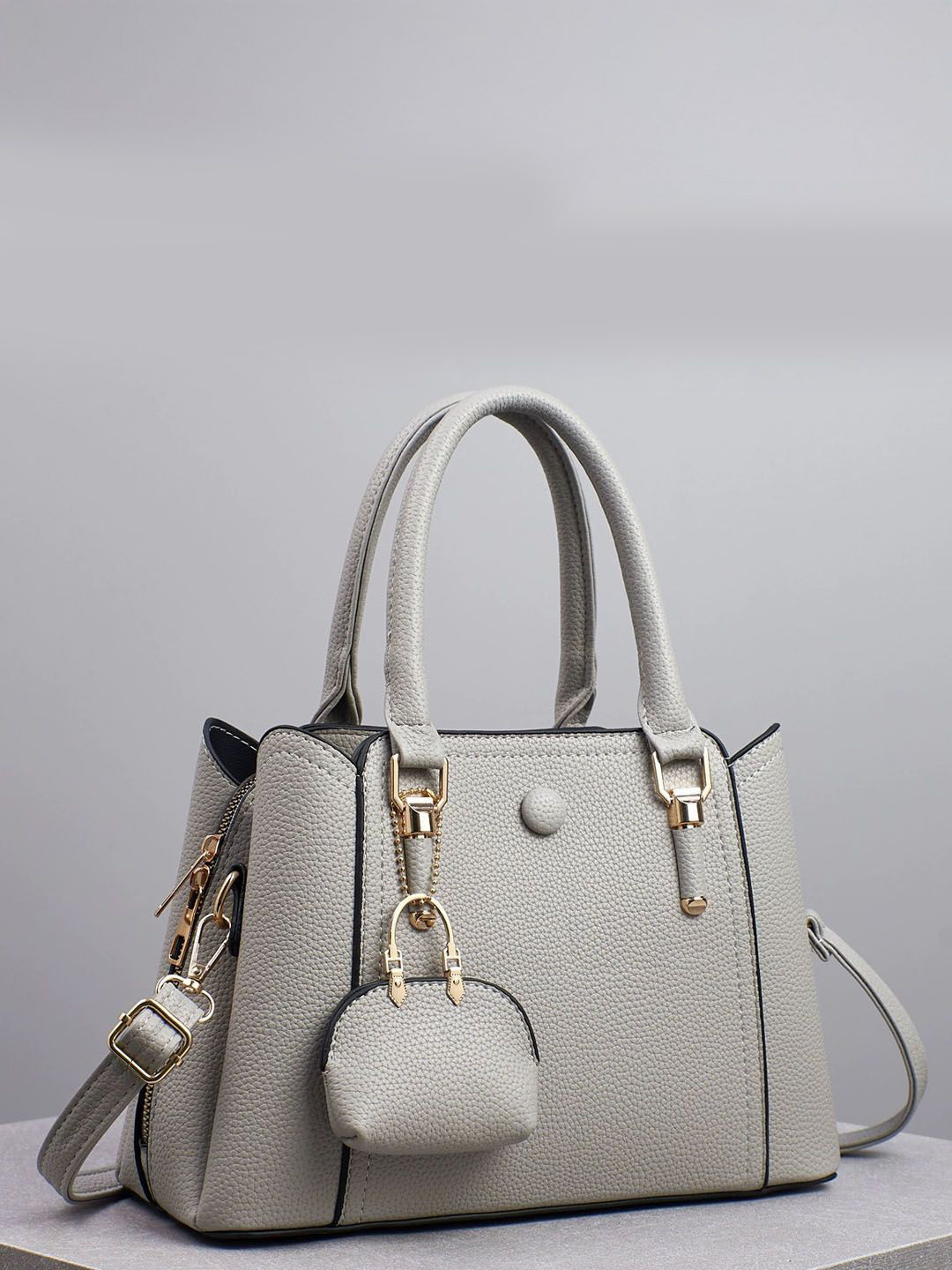 StyleCast Grey & Gold Toned Textured Structured Handheld Bag With Applique