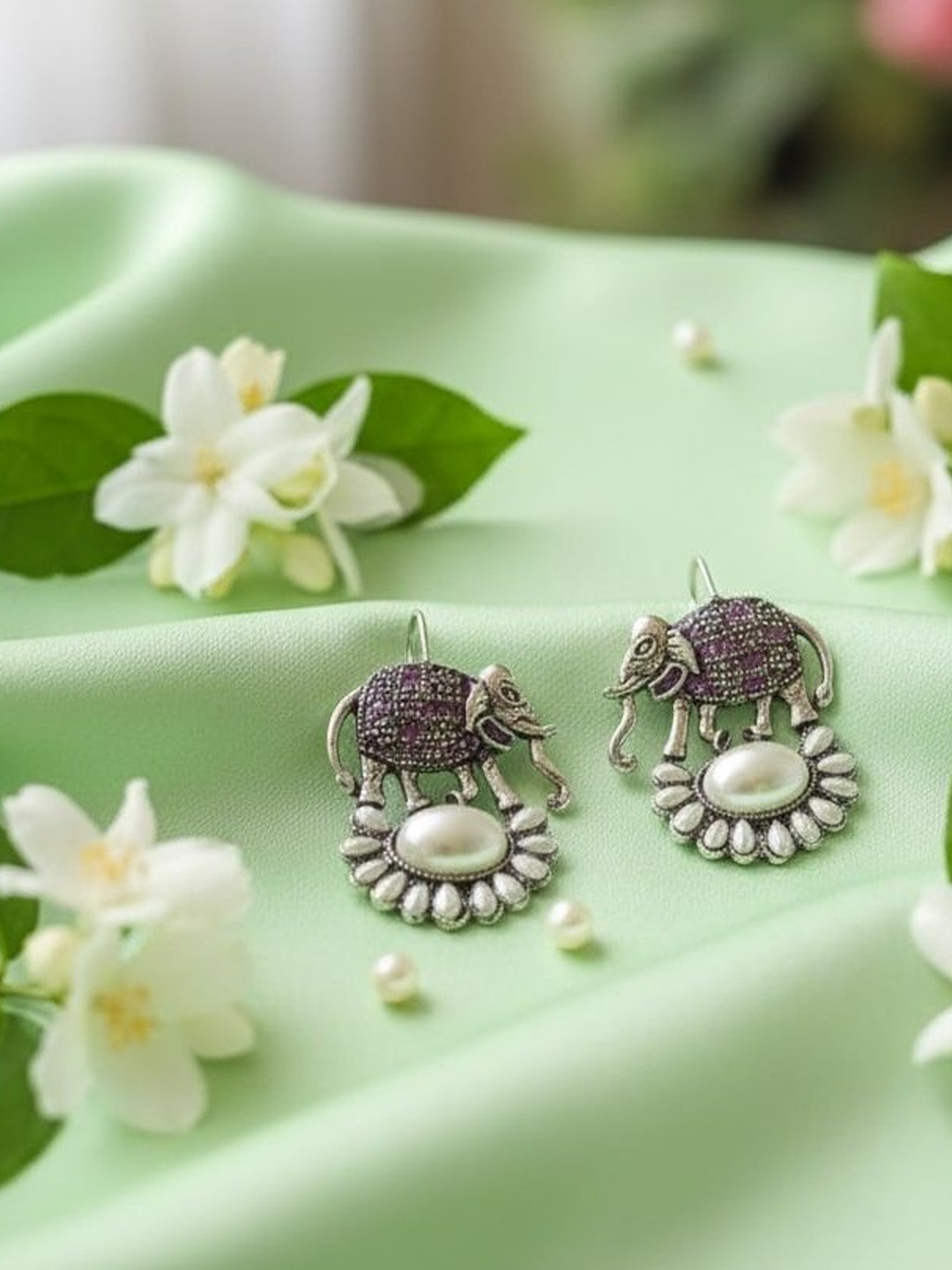 The Pari Silver Plated Pearls Studded Animal Shaped Oxidised Drop Earrings