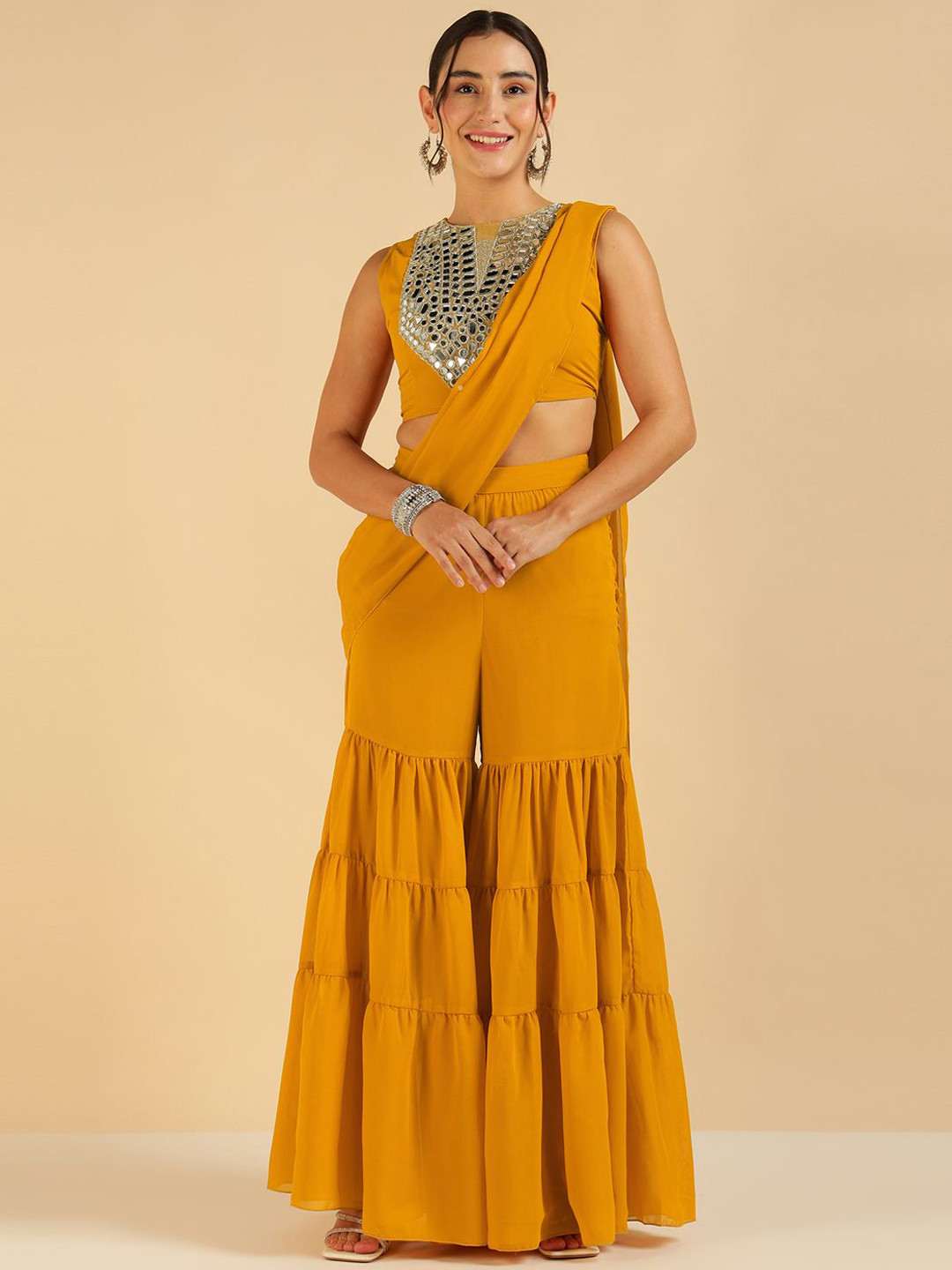 Vibes by Deebaco Embellished Sleeveless Pure Georgette Crop Top With Tiered Sharara Saree