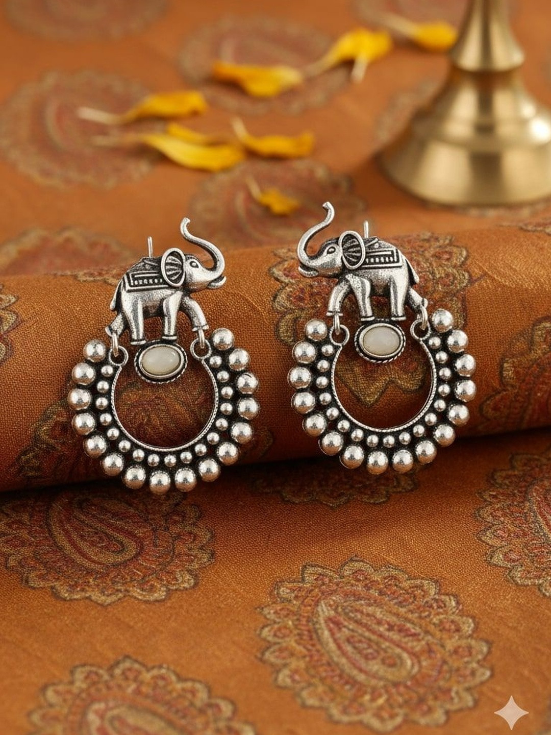 The Pari Silver Plated Artificial Stones  Studded Animal Shaped Drop Earrings
