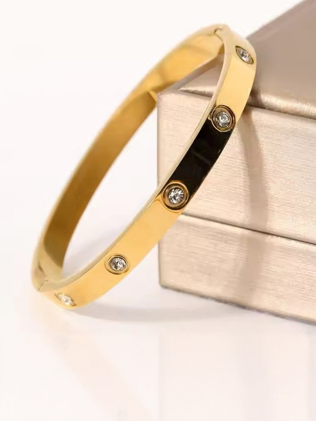 ISAMORA Stainless Steel Gold-Plated American Diamond Studded Bangle-Style Bracelet