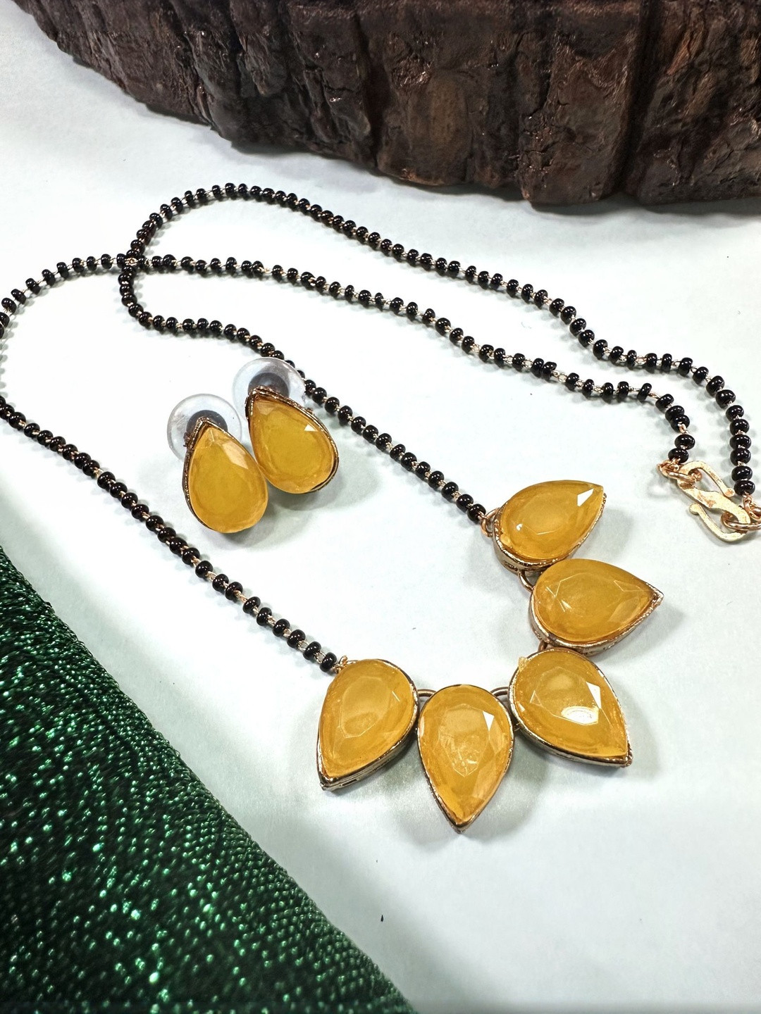 Anouk  Women Copper Black  & Yellow Artificial Stones and Beads Mangalsutra