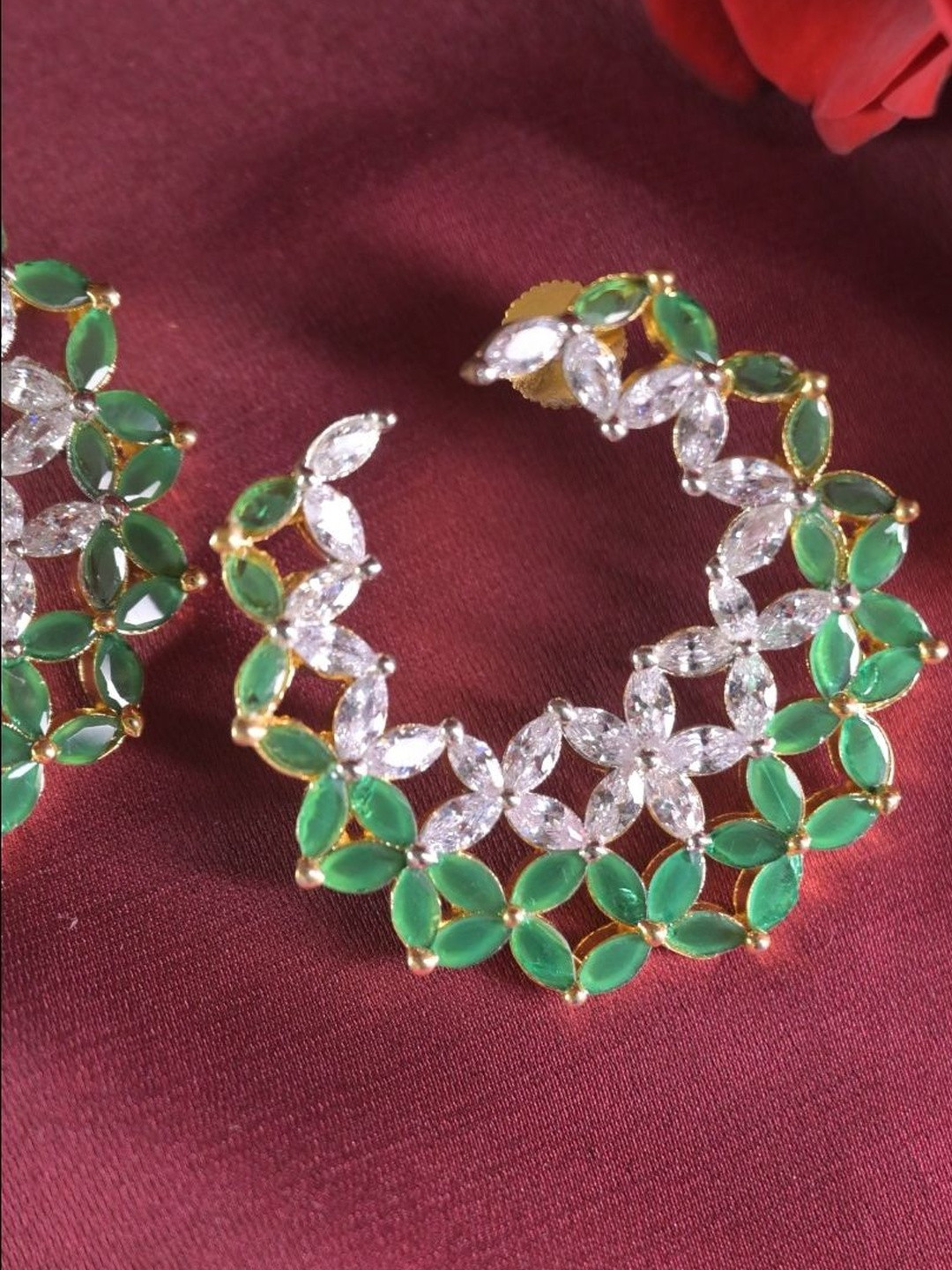 SWAN JEWELS Artificial Stones Studded Semi Circular Shaped Studs