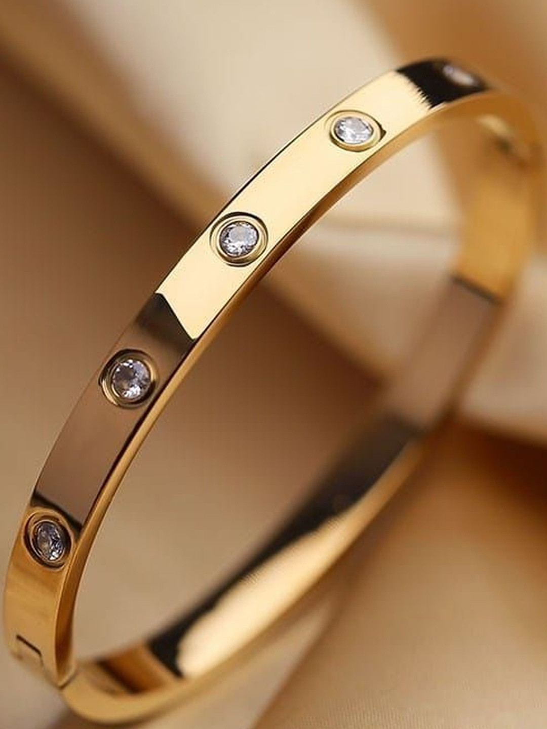 ISAMORA Stainless Steel Gold-Plated American Diamond Studded Bangle-Style Bracelet