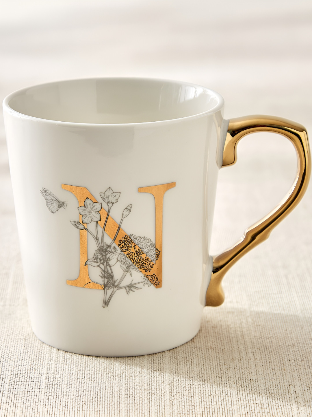 Home Centre Alphaa White & Gold-Toned N Printed Glossy Mug 350ml