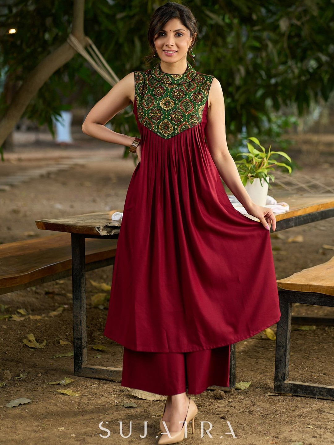 SUJATRA Women Maroon Halter Neck Kurta with Structured Pleats and Ajrakh Yoke