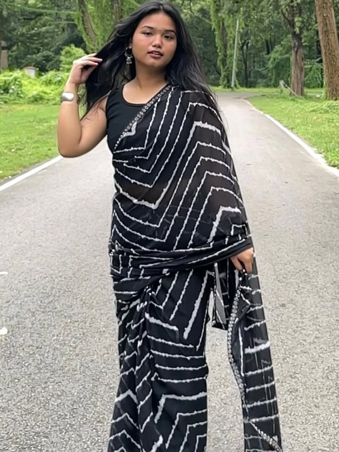 Moda Rapido Geometric Printed Saree With Mirror Work Border