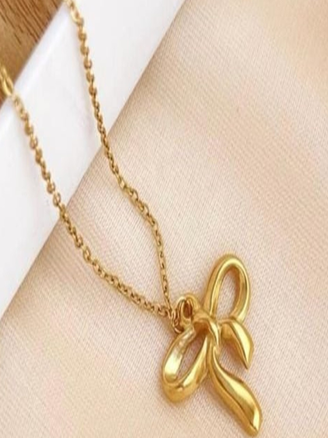 Yugosmile Women Gold-Plated Anti Tarnish Infinity Bow Pendant