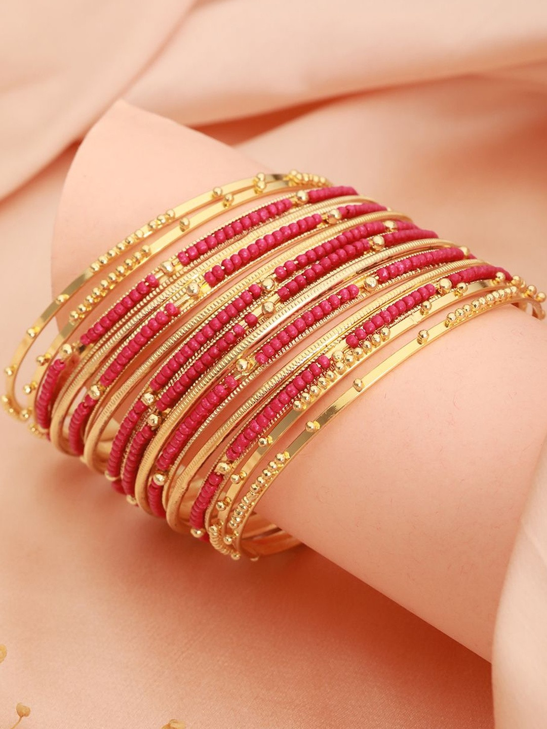Anouk Set of 12 Gold-Plated Rani Pink Stone-Studded & Beaded Bangle