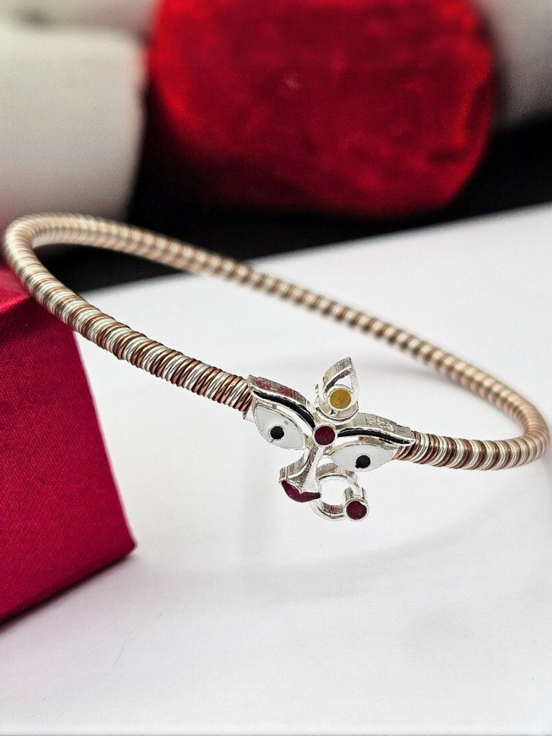 PARASMONI Women 1 Piece Silver-Plated Bangle With Spiritual Motif
