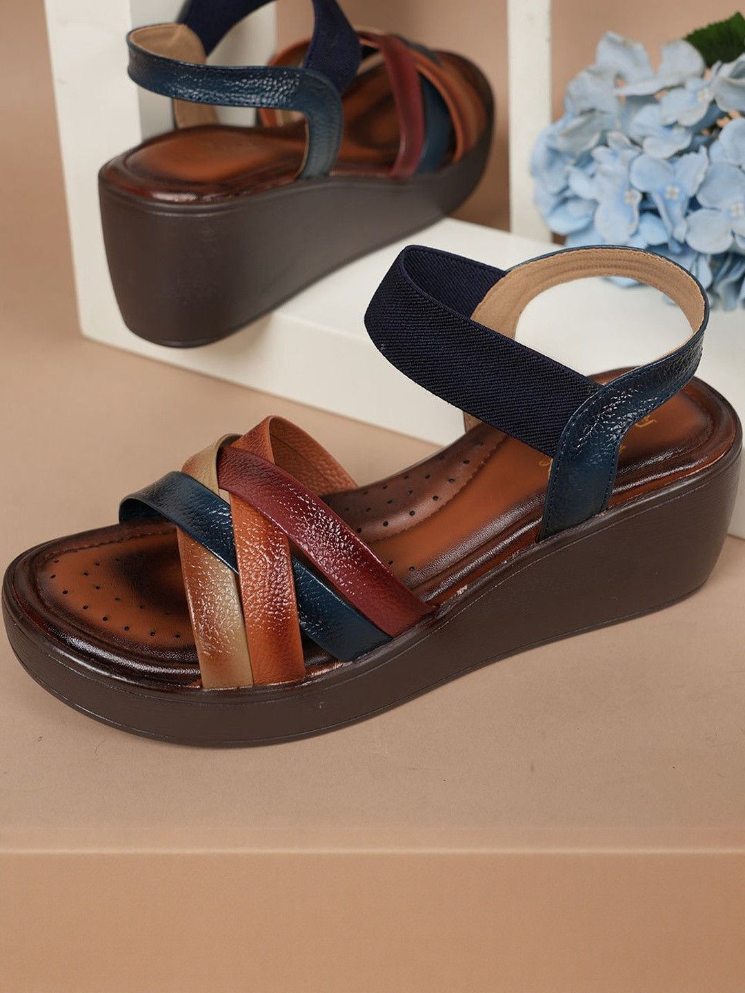 Dollphin Women Blue Textured Leather Platform Heels With Laser Cuts