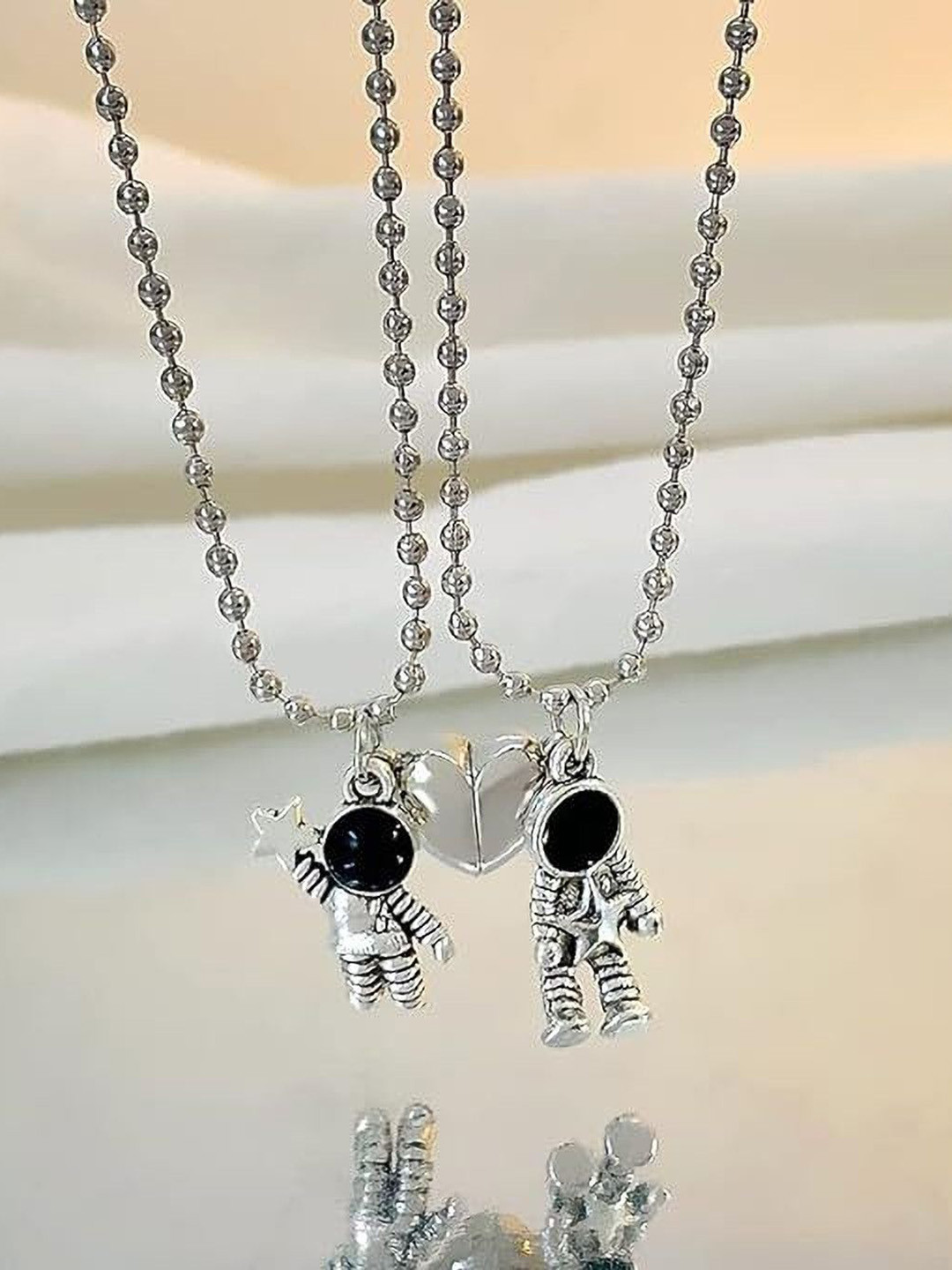 PASU FASHION Unisex Set of 2 Stainless Steel Astro Shaped Pendants With Chains