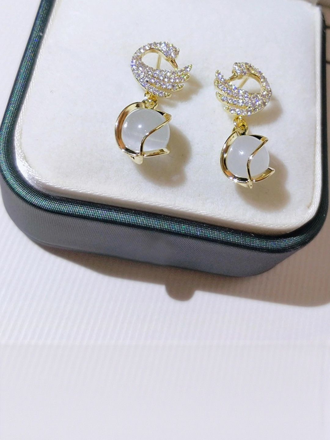 Tosilite Artificial Stones Studded And Beaded Peacock Shaped Drop Earrings